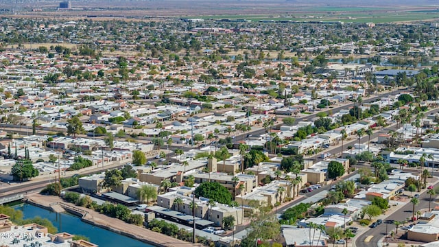 bird's eye view featuring a residential view and a water view