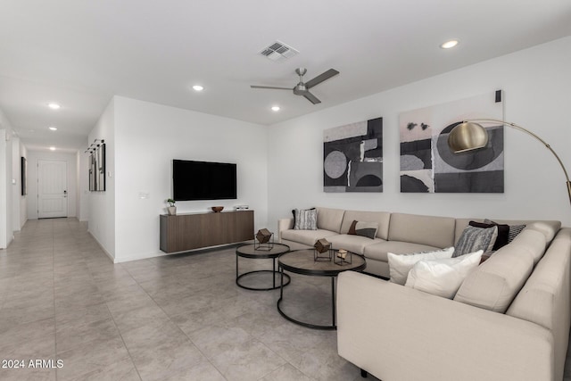 living room featuring ceiling fan