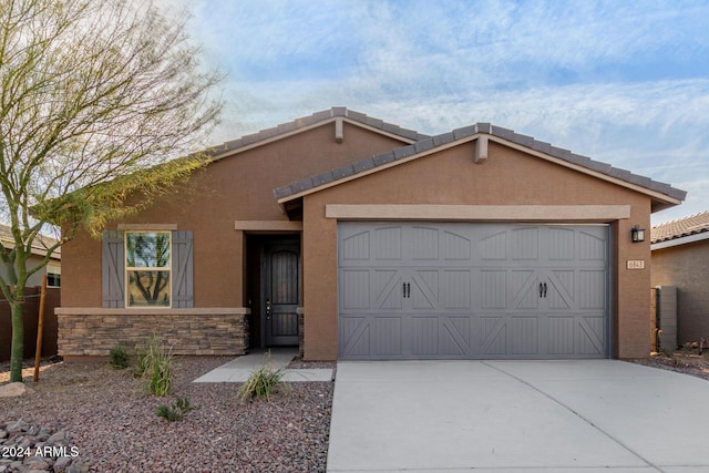 view of front of home with a garage