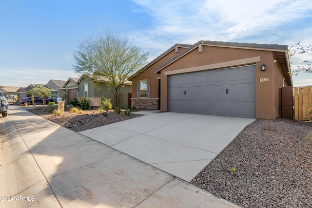 single story home featuring a garage