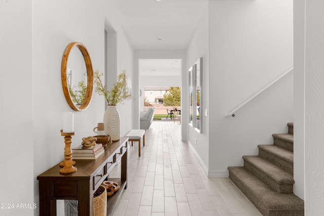 hallway with light wood-type flooring