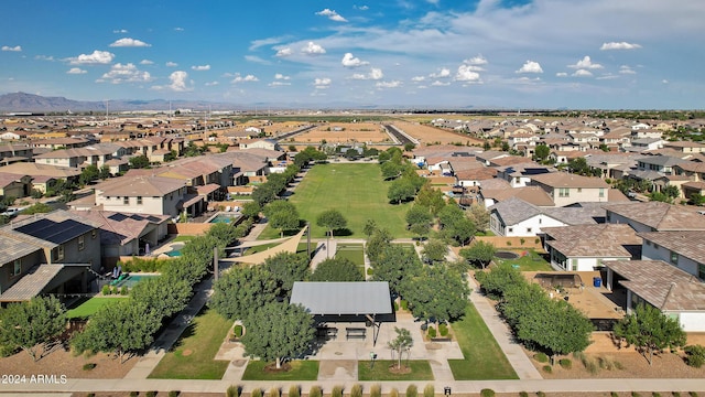 birds eye view of property featuring a mountain view