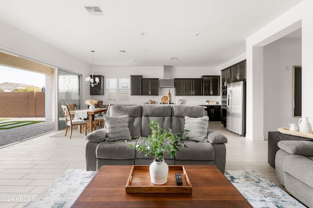 living room featuring an inviting chandelier