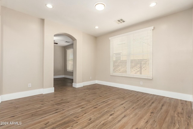 unfurnished room featuring wood-type flooring