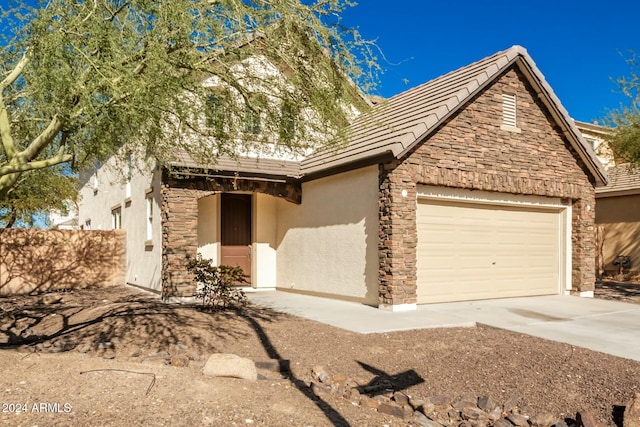 view of front of house with a garage