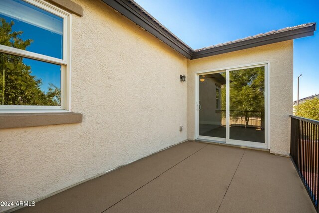 view of patio with a balcony