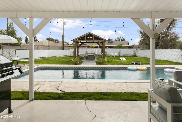 view of pool featuring a gazebo, a yard, an outdoor hangout area, and a patio area