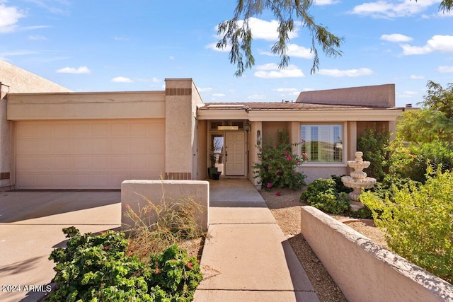 view of front of house with a garage