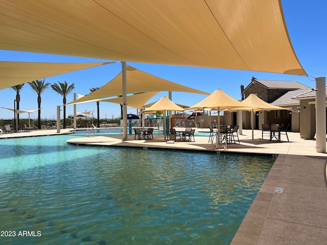 view of pool with a patio