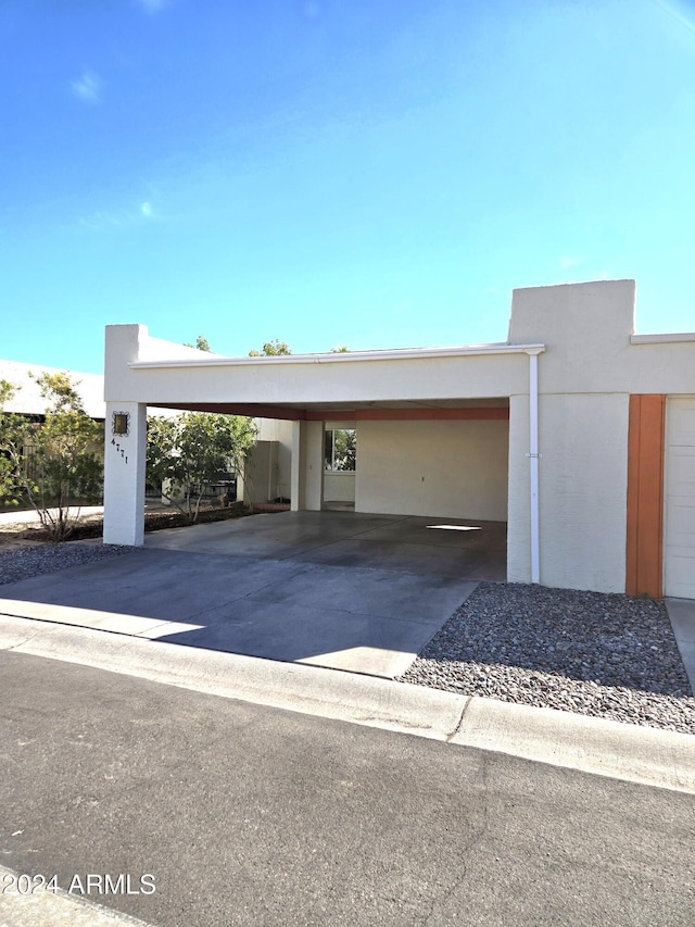 exterior space with a garage