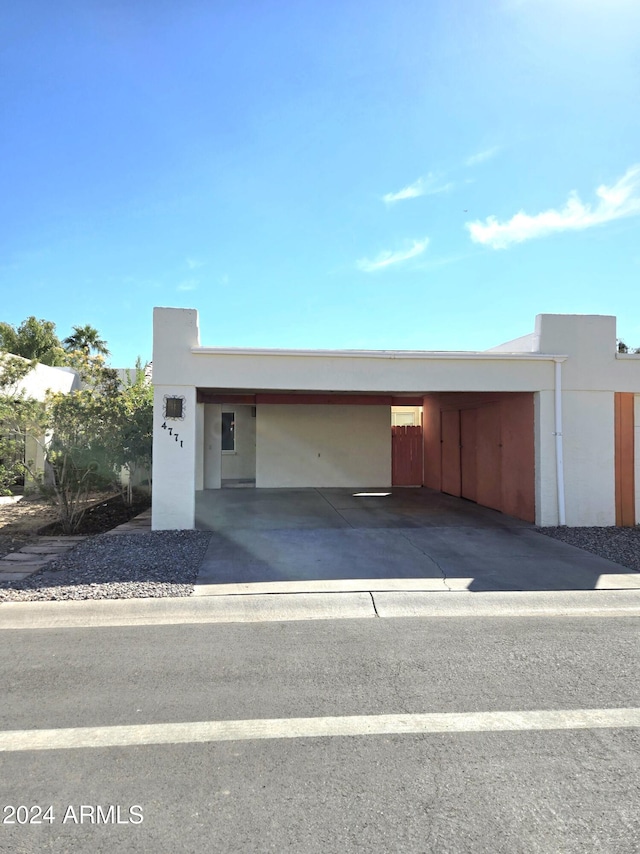 garage with a carport