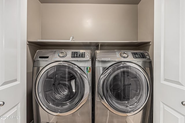 4805 N Woodmere Fairway Unit 1002, Scottsdale, AZ 85251 - laundry room featuring washing machine and dryer