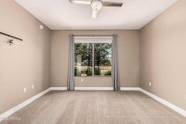 4805 N Woodmere Fairway Unit 1002, Scottsdale, AZ 85251 - unfurnished room with ceiling fan and carpet flooring