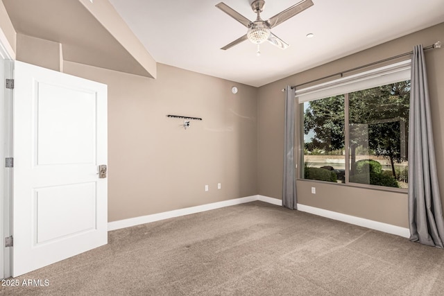 4805 N Woodmere Fairway Unit 1002, Scottsdale, AZ 85251 - carpeted spare room featuring ceiling fan and baseboards