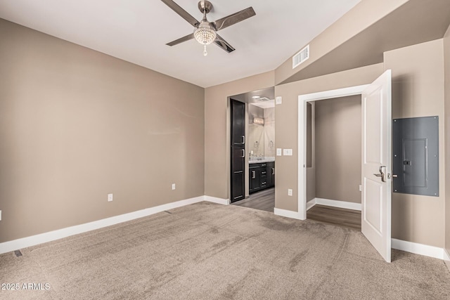 4805 N Woodmere Fairway Unit 1002, Scottsdale, AZ 85251 - unfurnished bedroom with carpet, connected bathroom, and a ceiling fan