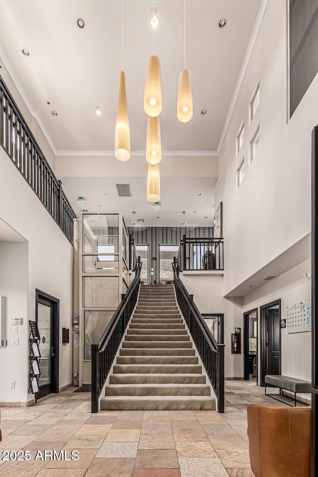 4805 N Woodmere Fairway Unit 1002, Scottsdale, AZ 85251 - common area featuring a high ceiling, stairway, crown molding, and recessed lighting