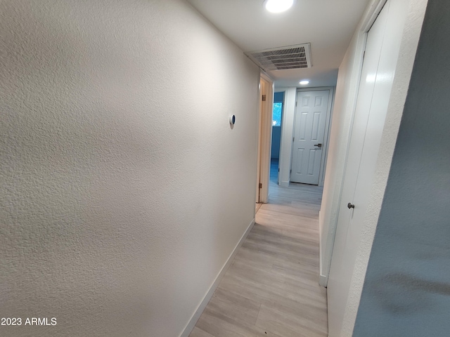 3208 W Bloomfield Rd, Phoenix, AZ 85029 - corridor featuring light wood finished floors, baseboards, and recessed lighting