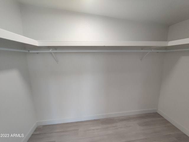 3208 W Bloomfield Rd, Phoenix, AZ 85029 - spacious closet featuring light wood-style floors