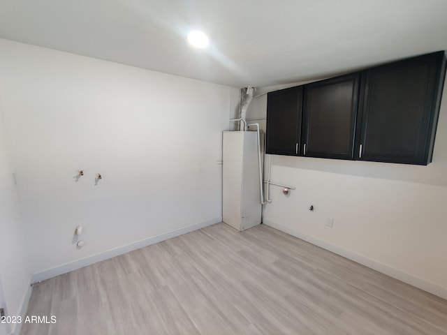 3208 W Bloomfield Rd, Phoenix, AZ 85029 - empty room with light wood finished floors and baseboards