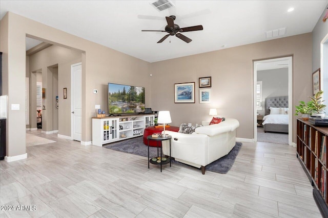 living room with ceiling fan