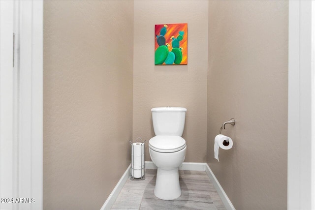 bathroom featuring toilet