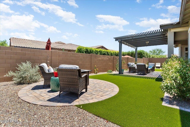 view of yard with a pergola, an outdoor hangout area, and a patio area