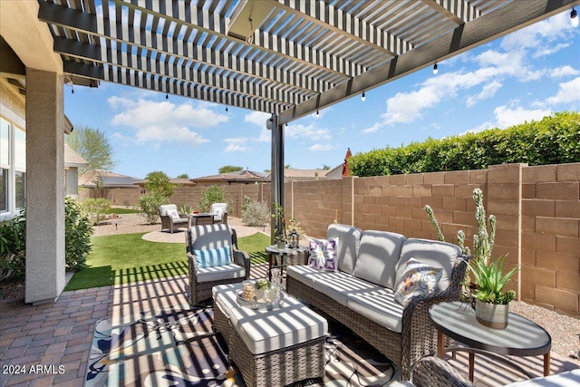 view of patio featuring an outdoor living space and a pergola