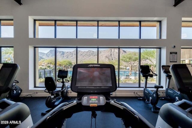 gym featuring a mountain view