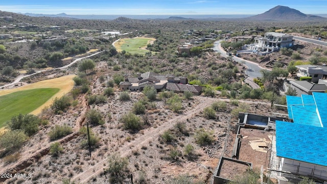 birds eye view of property featuring a mountain view