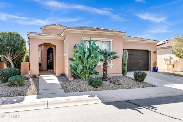 view of front of property featuring a garage