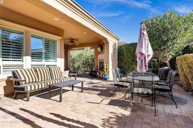 view of patio / terrace with ceiling fan and an outdoor hangout area