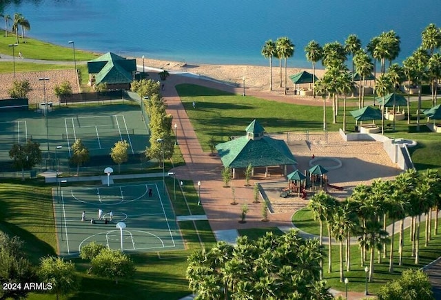 birds eye view of property with a water view