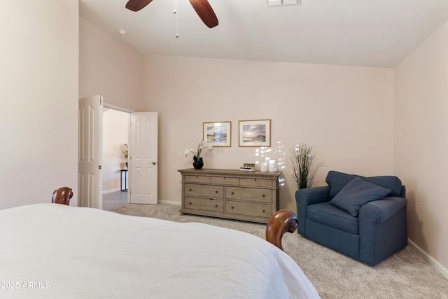 bedroom featuring light colored carpet and ceiling fan