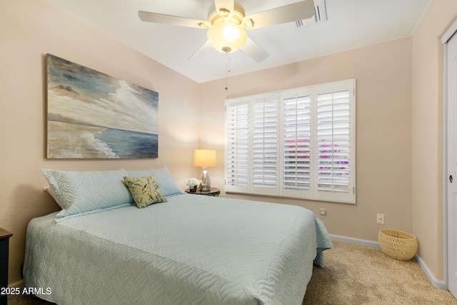 bedroom featuring ceiling fan and light colored carpet