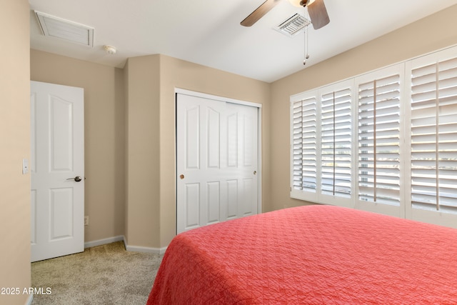 bedroom with light carpet, a closet, and ceiling fan