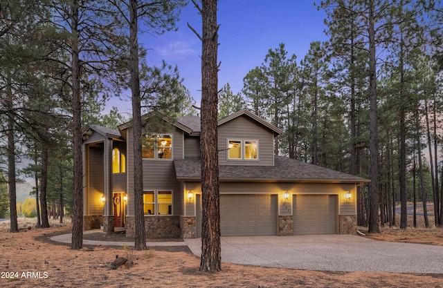 view of front of home with a garage