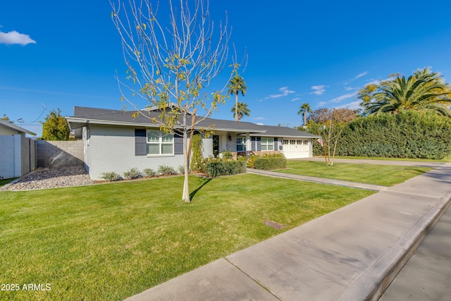 ranch-style home featuring a front yard