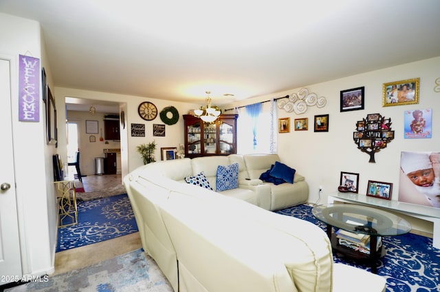 living room featuring an inviting chandelier