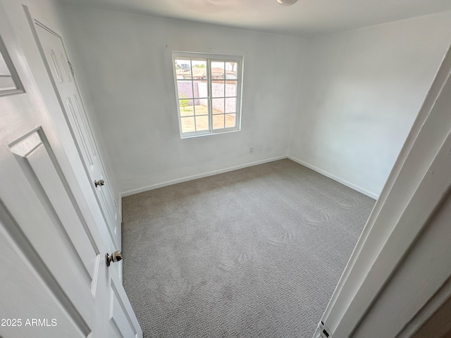 2928 N 37th Ave, Phoenix, AZ 85019 - unfurnished room with carpet and baseboards