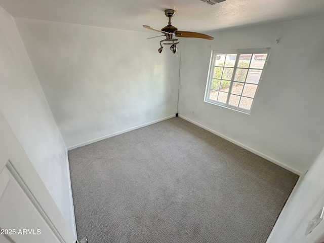 2928 N 37th Ave, Phoenix, AZ 85019 - carpeted spare room with baseboards and ceiling fan