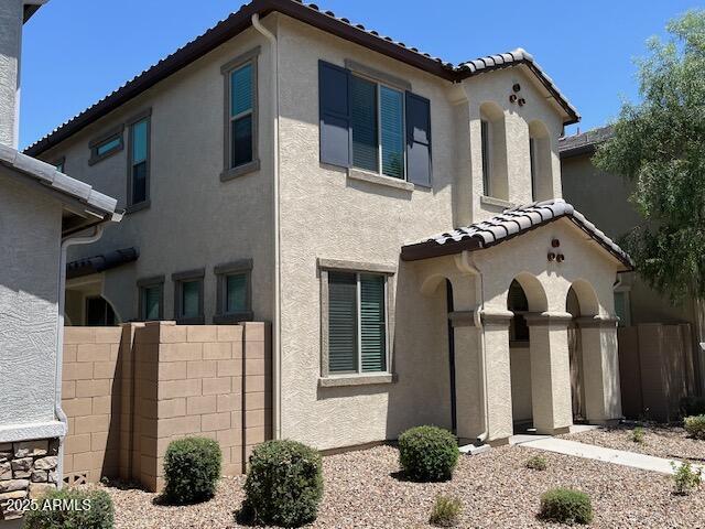 1718 S 82nd Way, Mesa, AZ 85209 - view of home's exterior with a tiled roof and stucco siding