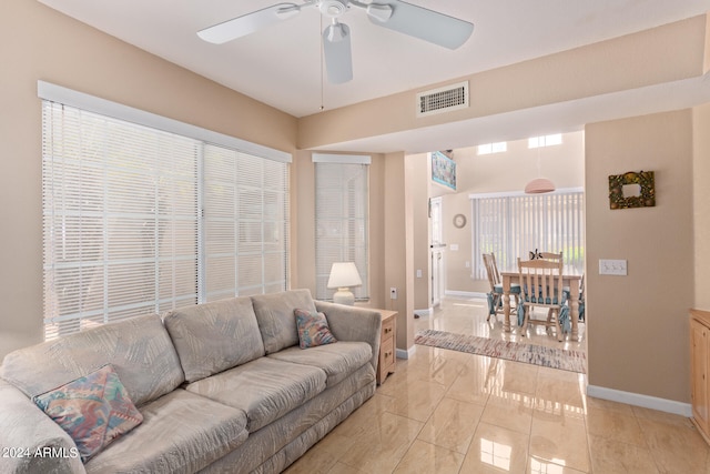 living room with ceiling fan