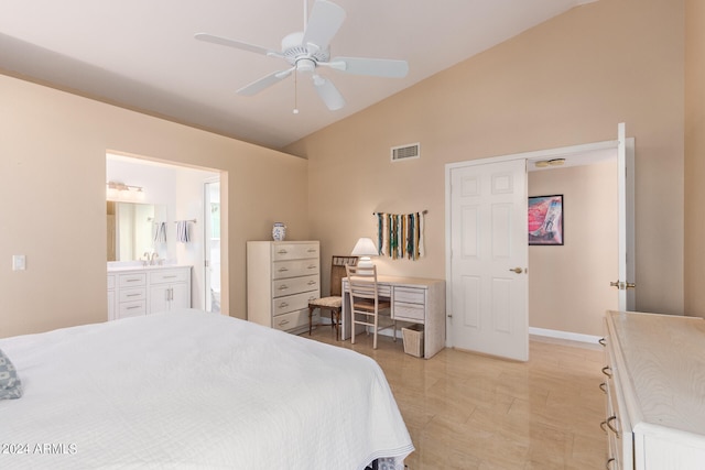 bedroom with connected bathroom, vaulted ceiling, and ceiling fan