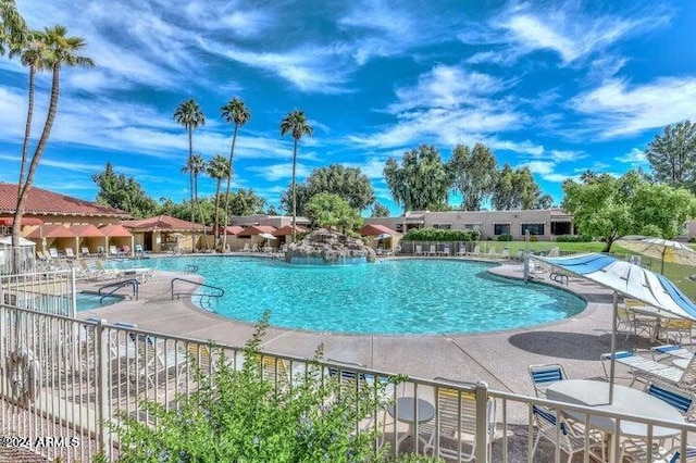 view of pool featuring a patio