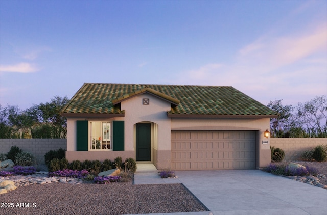 15611 W Hackamore Dr, Surprise, AZ 85387 - mediterranean / spanish-style home with stucco siding, driveway, an attached garage, and a tiled roof
