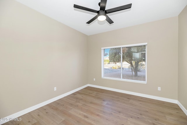 spare room with ceiling fan and light hardwood / wood-style flooring