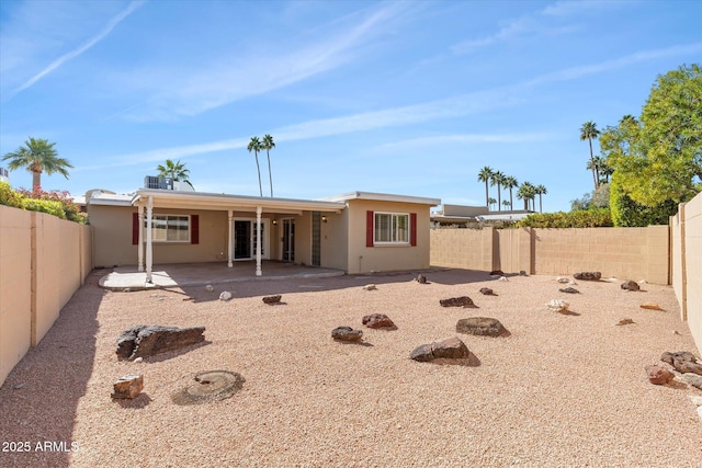 rear view of house with a patio area