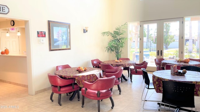 dining space with french doors and plenty of natural light