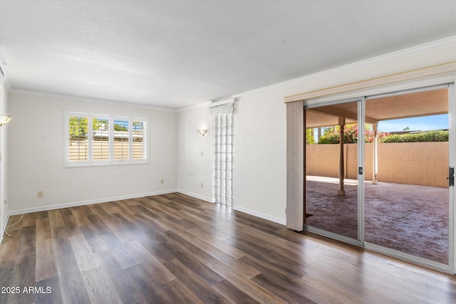 spare room with crown molding and dark wood-type flooring