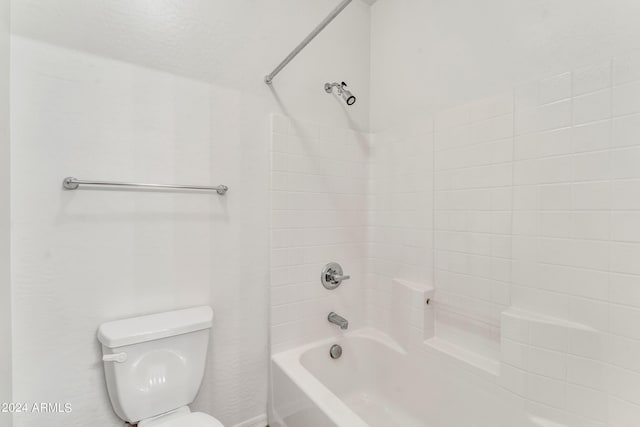 full bath featuring shower / tub combination and toilet